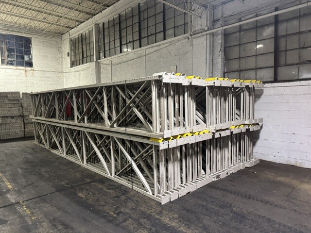 Racking equipment organized for indoor overflow storage at NOW Logistics
