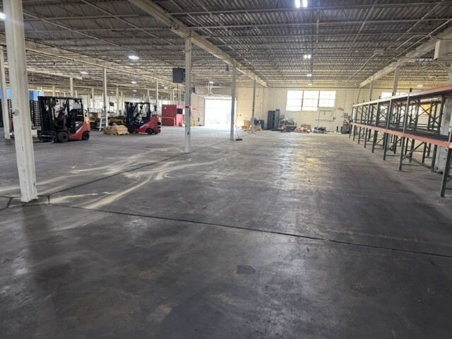 NOW Logistics forklift handling freight